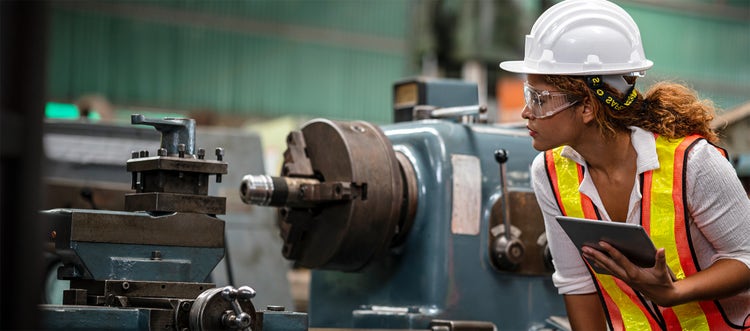 female-engineer-inspecting-machineryv2.jpg